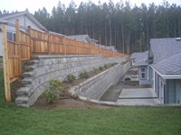 4800 sq.ft. Lock + Load Retaining Wall for the Woodlands patio home strata at the end of Blue Jay Place, Courtenay, BC.